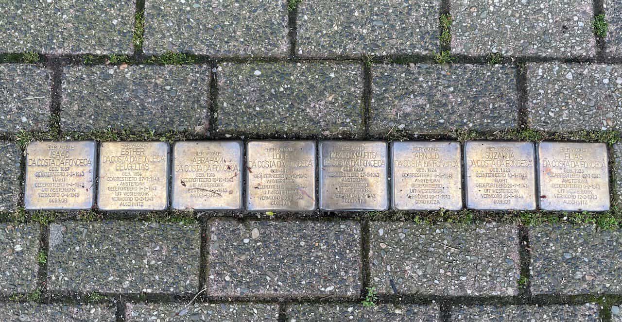 small gold squares in europes sidewalks - Stumbling stones for family Costa da Fonceca in Amsterdam