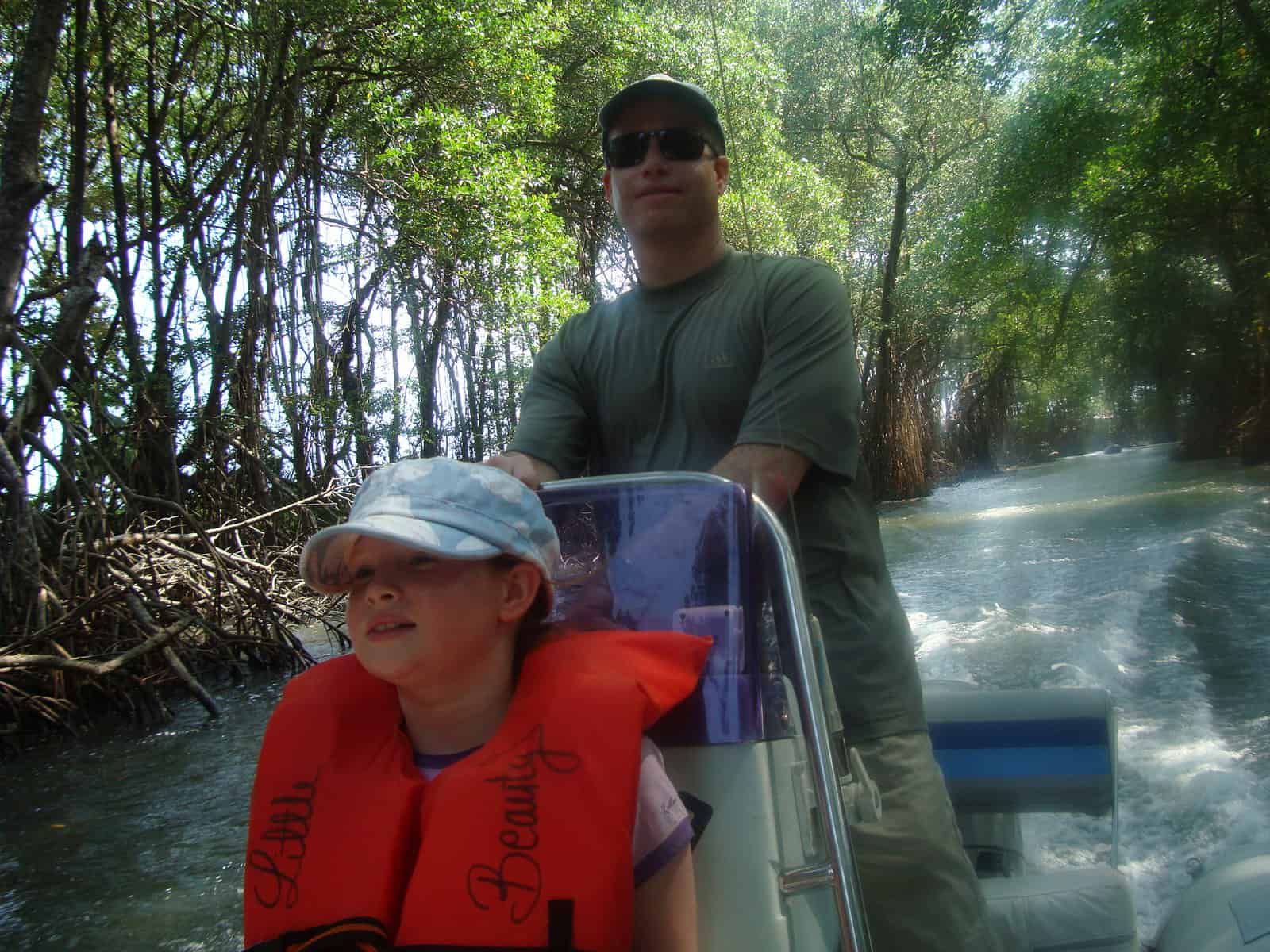 Mark captaining the boat in Belize
