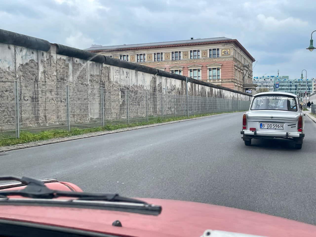 Driving a Trabi along the Berlin Wall in Berlin, Germany 2023
