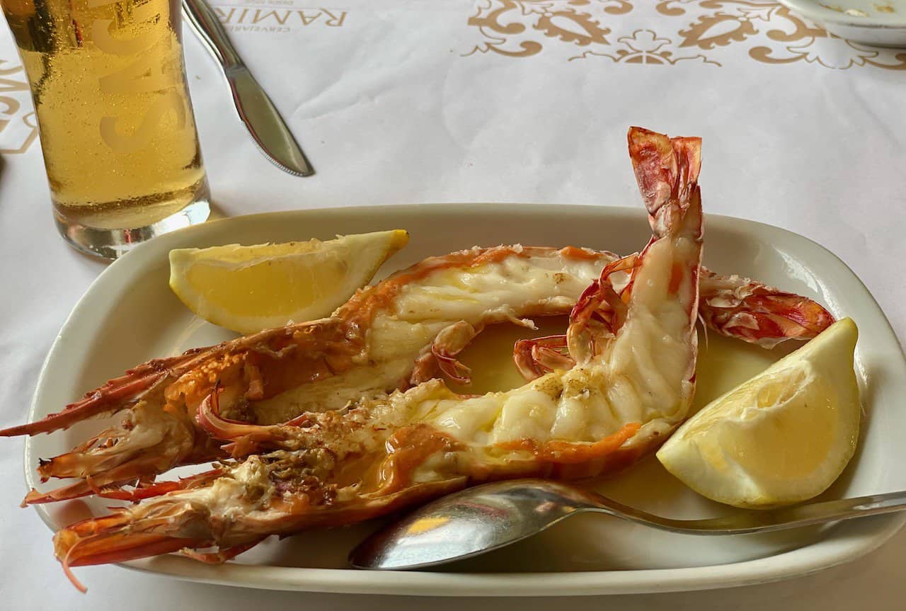 Large buttery prawns with lemon at Ramiro in Lisbon.