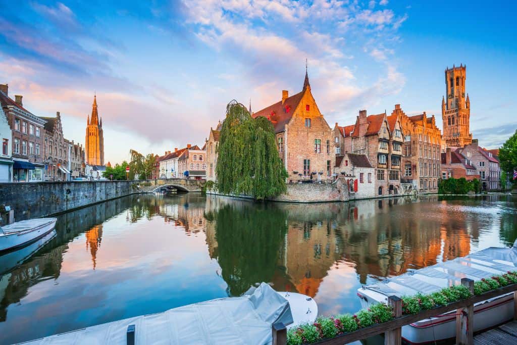 Glassy canals in Bruges, Belgium make for a romantic setting.