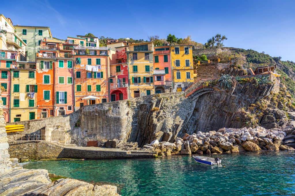 Colorful towns built into the hillside overlooking the sea provide a romantic setting.