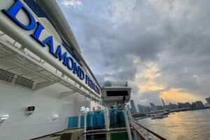 Diamond Princess cruise ship sails into the sunset off the coast of Yokohama, Japan